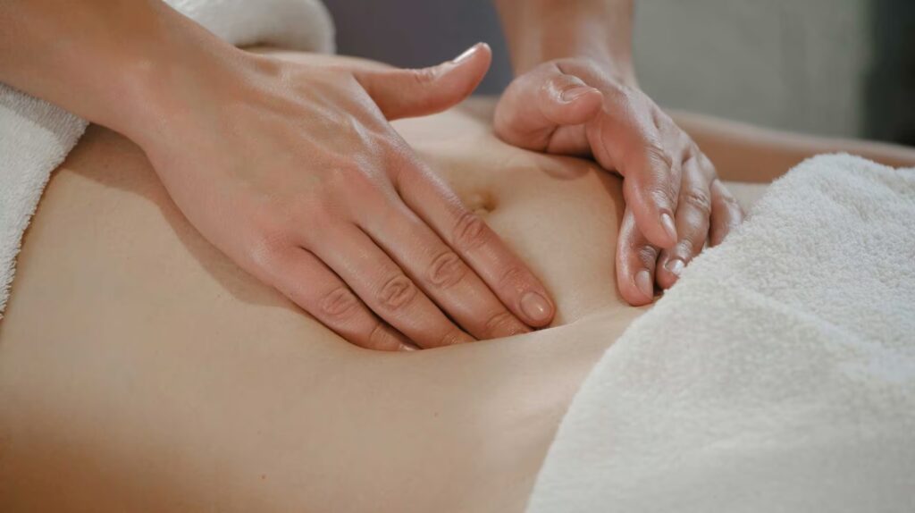 woman receiving professional belly massage in well 2025 03 08 14 49 17 utc